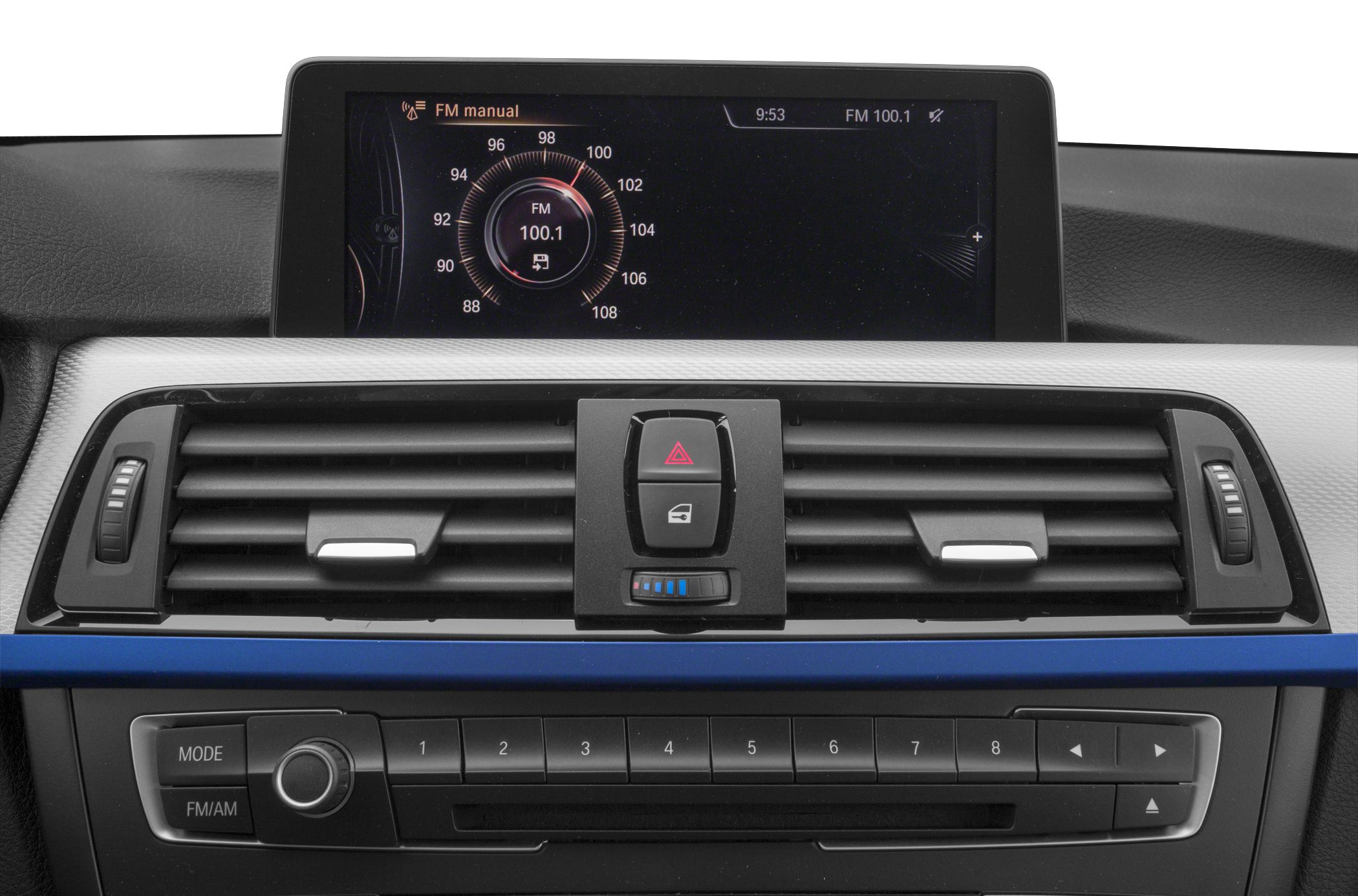 Car interior dashboard with radio controls and central air vents.