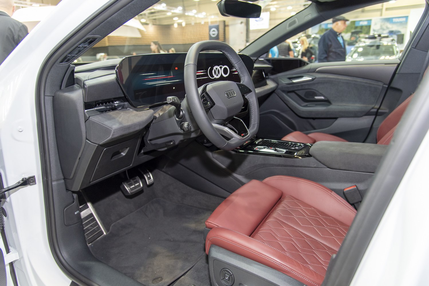Digital dashboard, leather seats, steering wheel, modern interior design