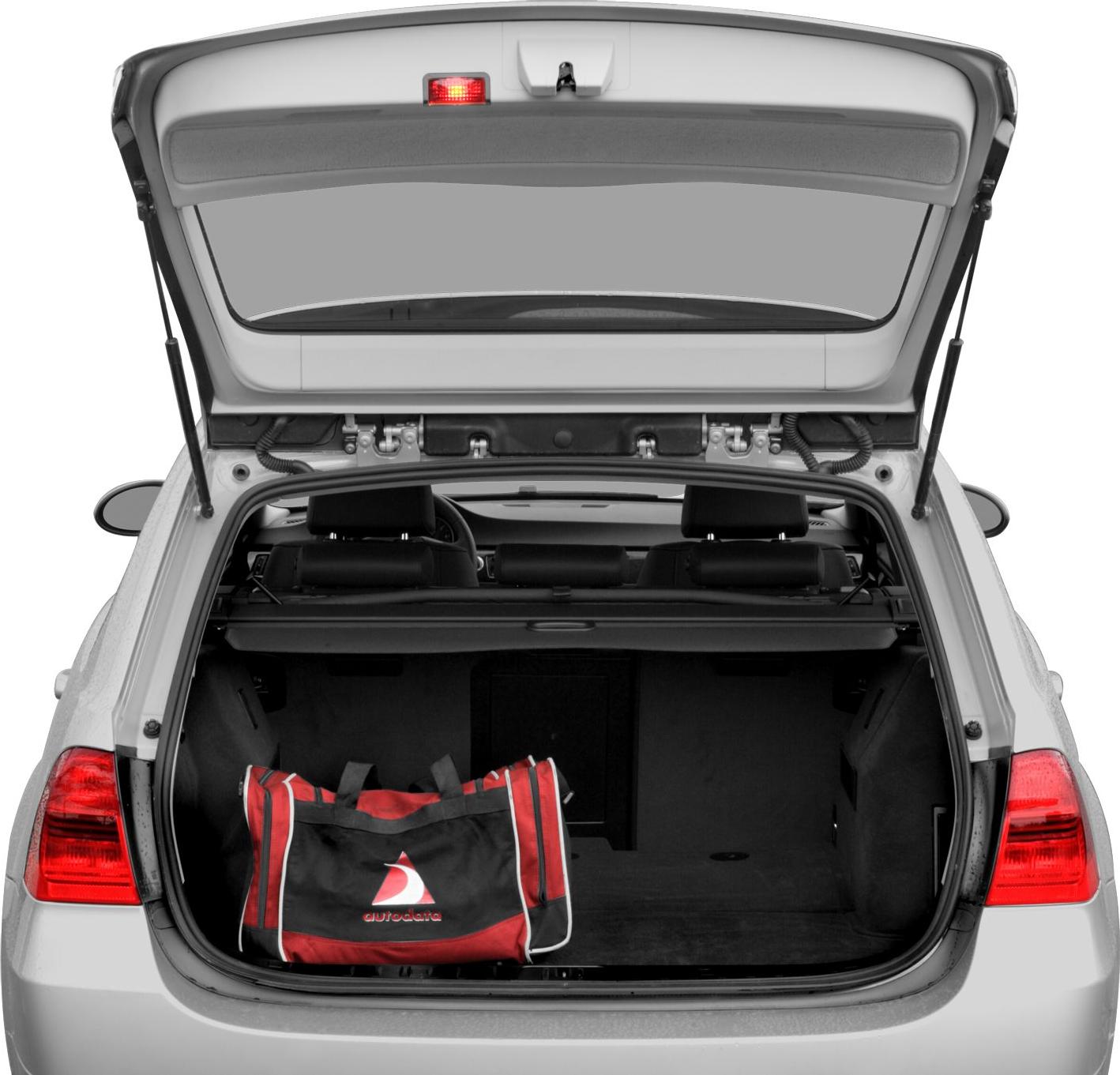 Open rear hatch with spacious cargo area and a duffel bag inside