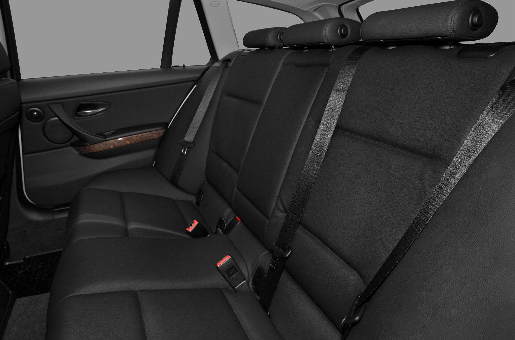Black leather rear seats with seat belts and headrests