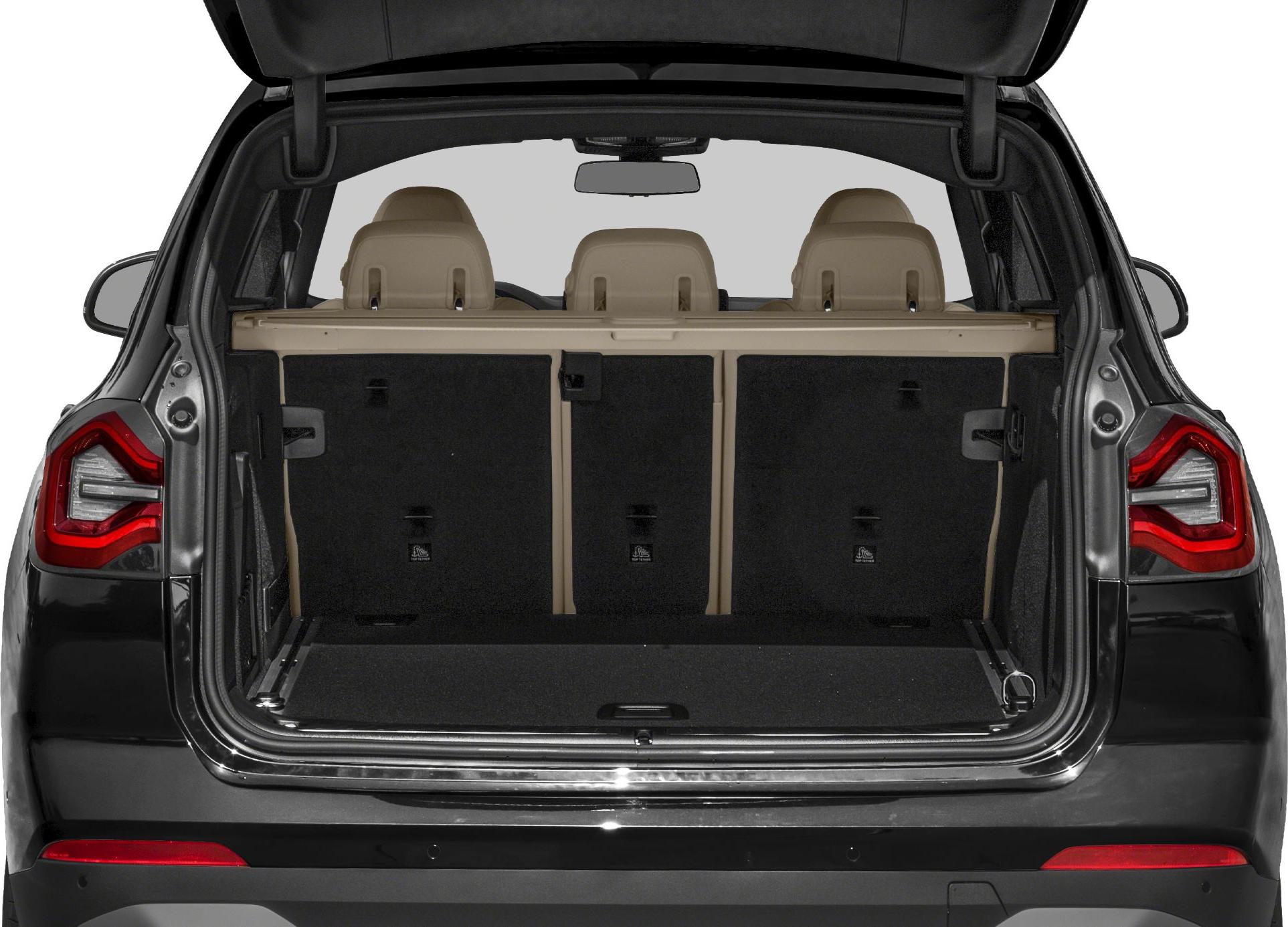 Spacious SUV trunk with beige rear seats and modern taillights