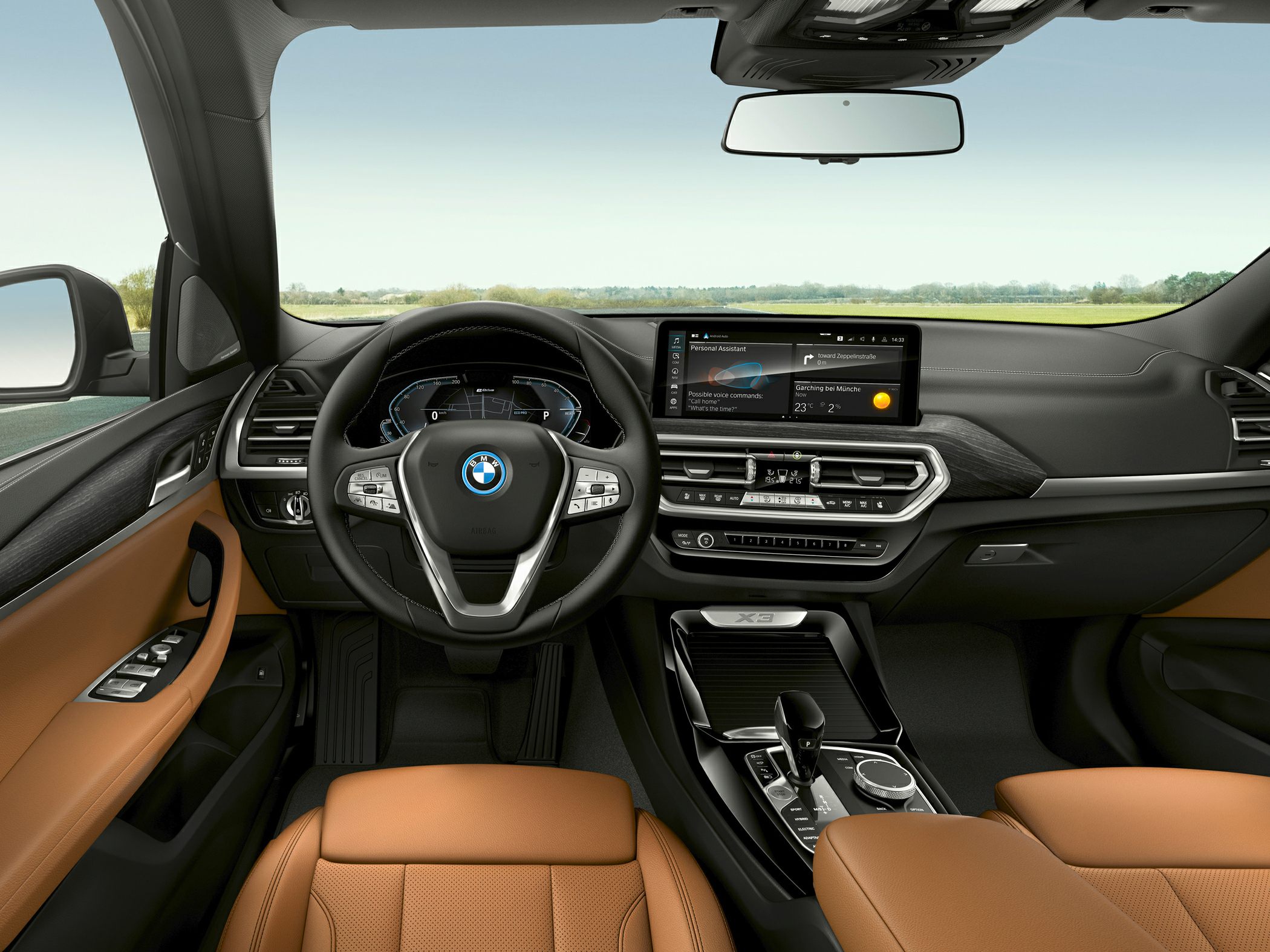 Digital cockpit and infotainment display with brown leather seats