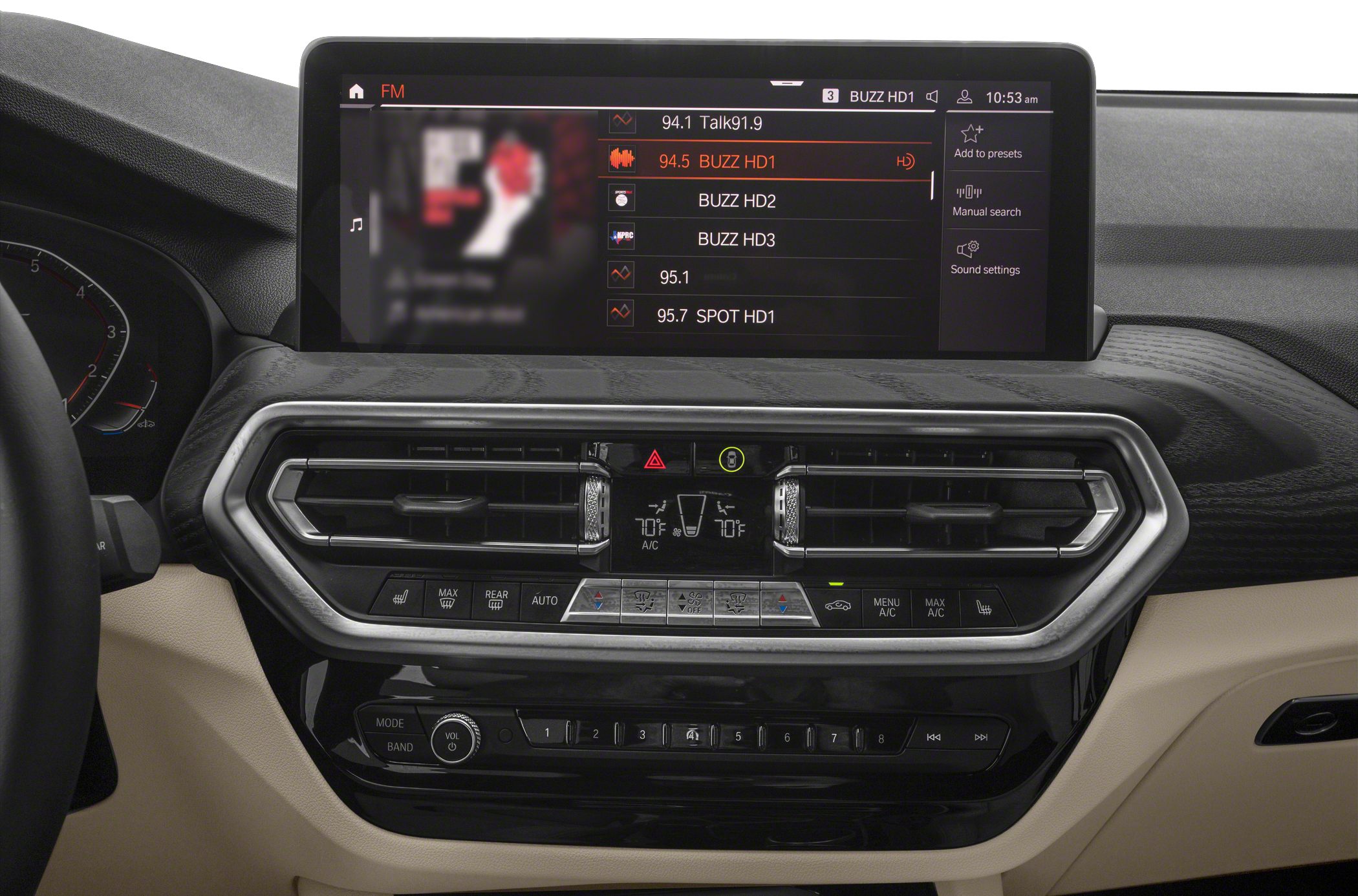 Dashboard with infotainment screen and digital climate controls.