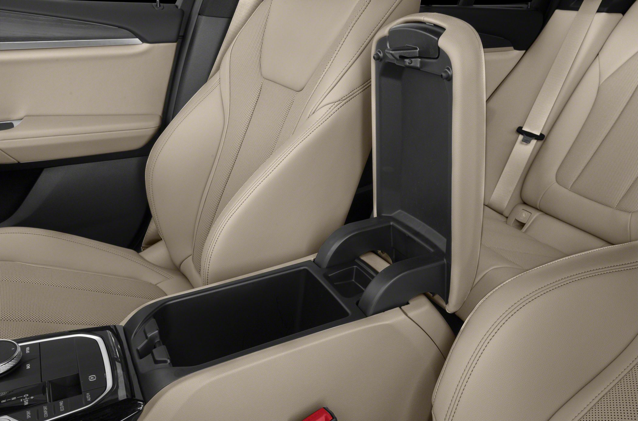 Beige leather seats and open center console storage compartment