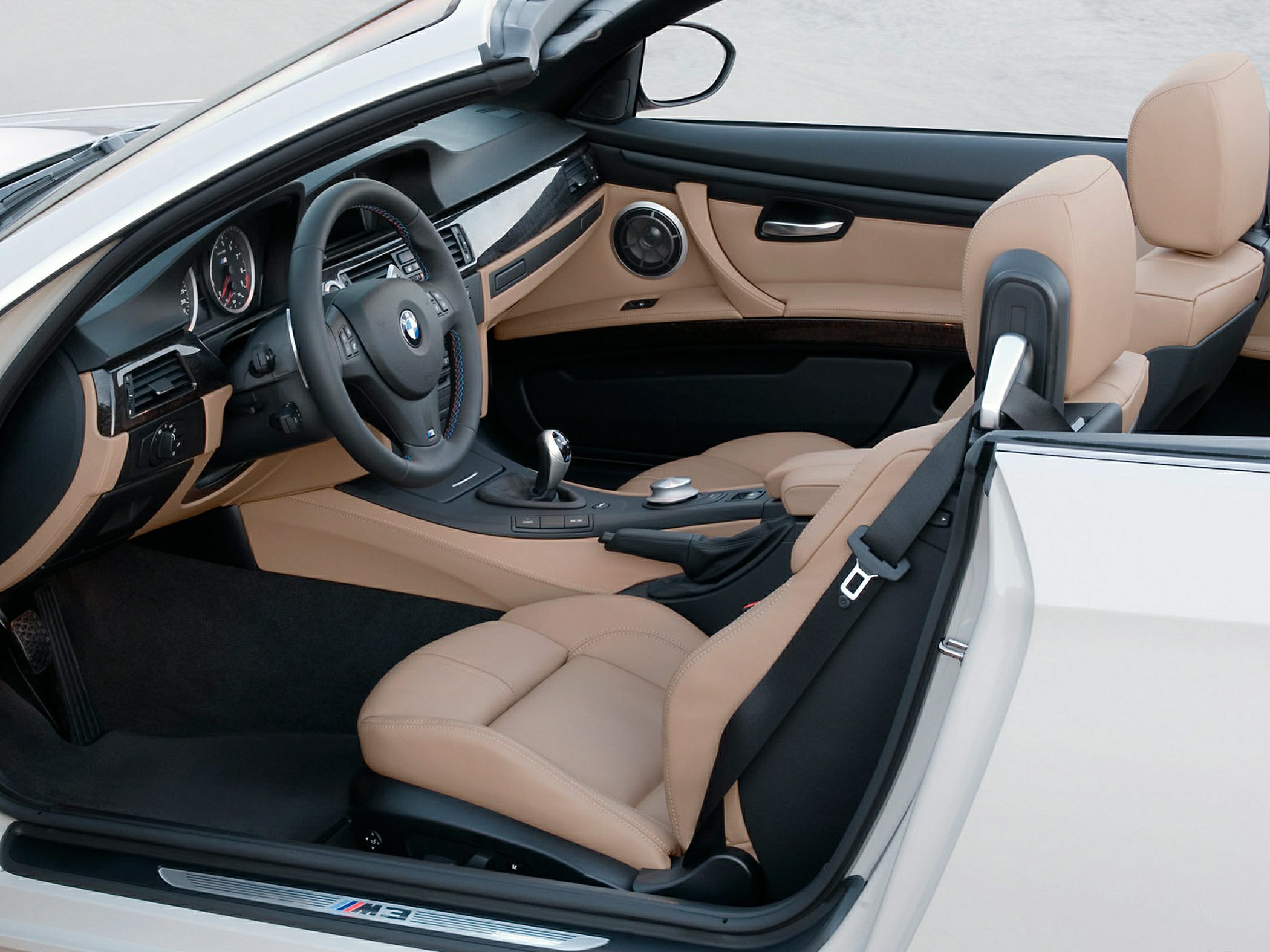 Beige leather interior with dashboard and steering wheel
