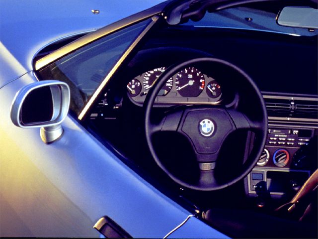 Closeup of BMW M3 E36 convertible dashboard and steering wheel