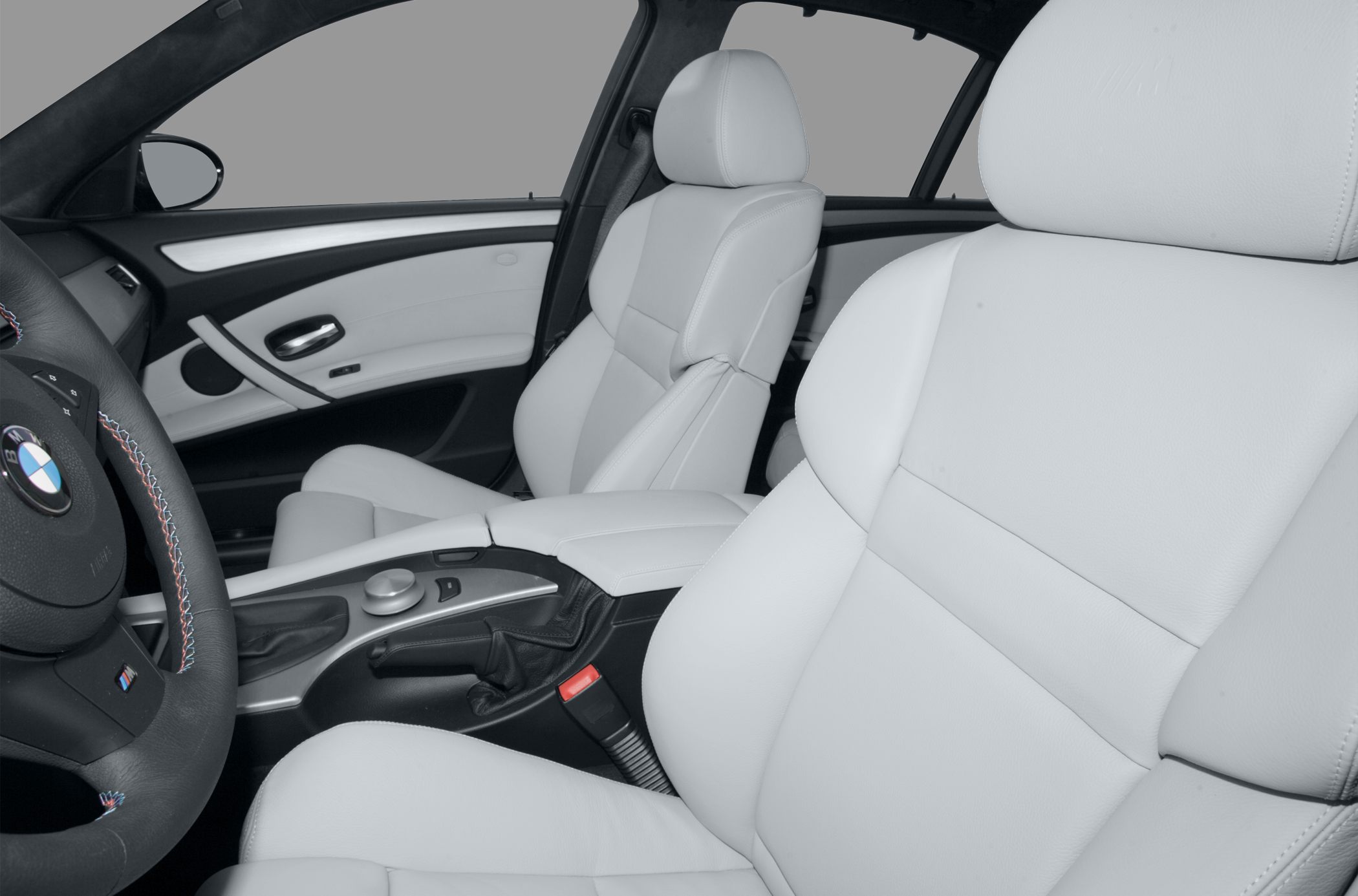 Luxury leather seats and central control console in car interior