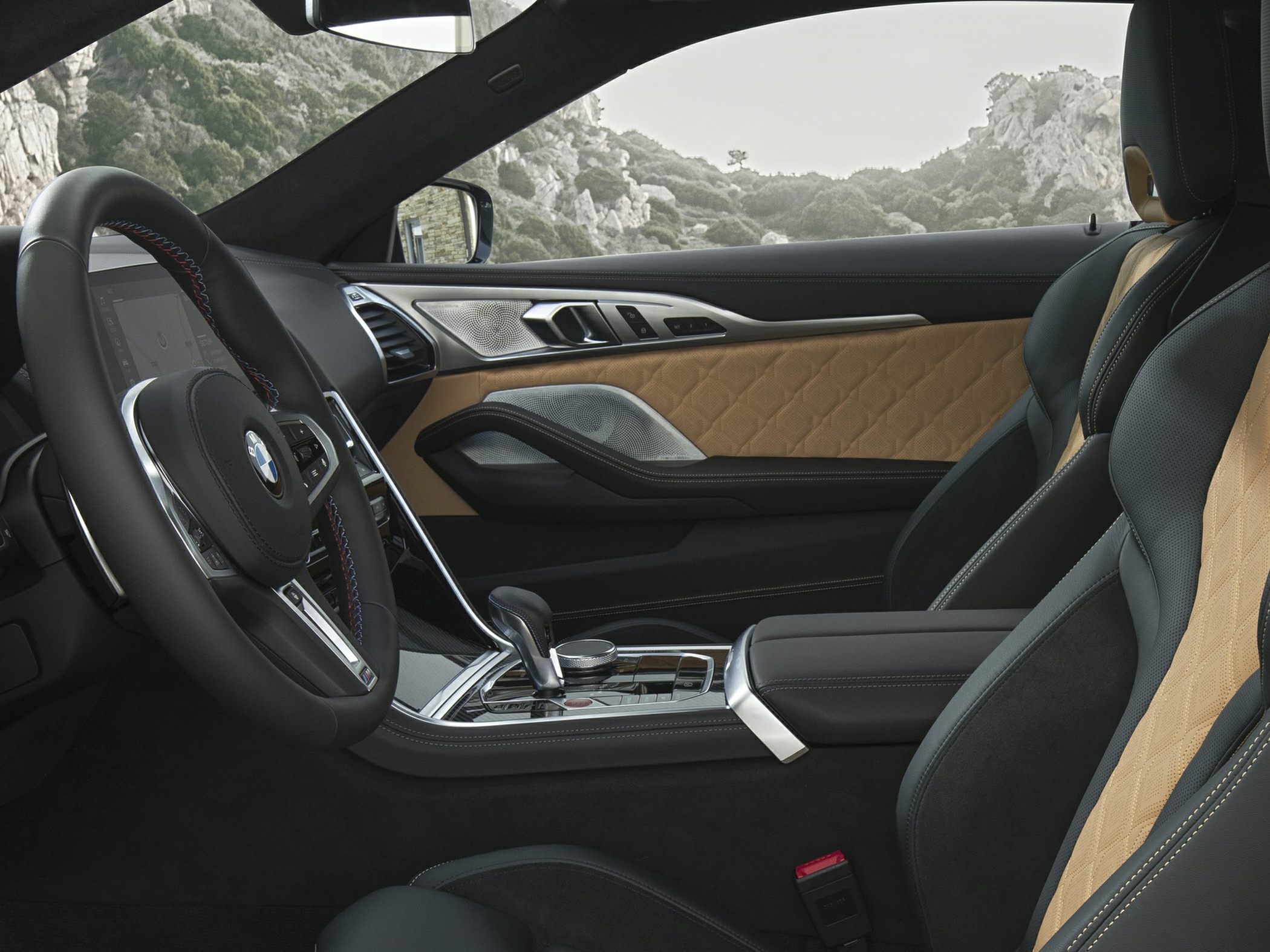 Luxury car interior with leather seats and advanced control panel