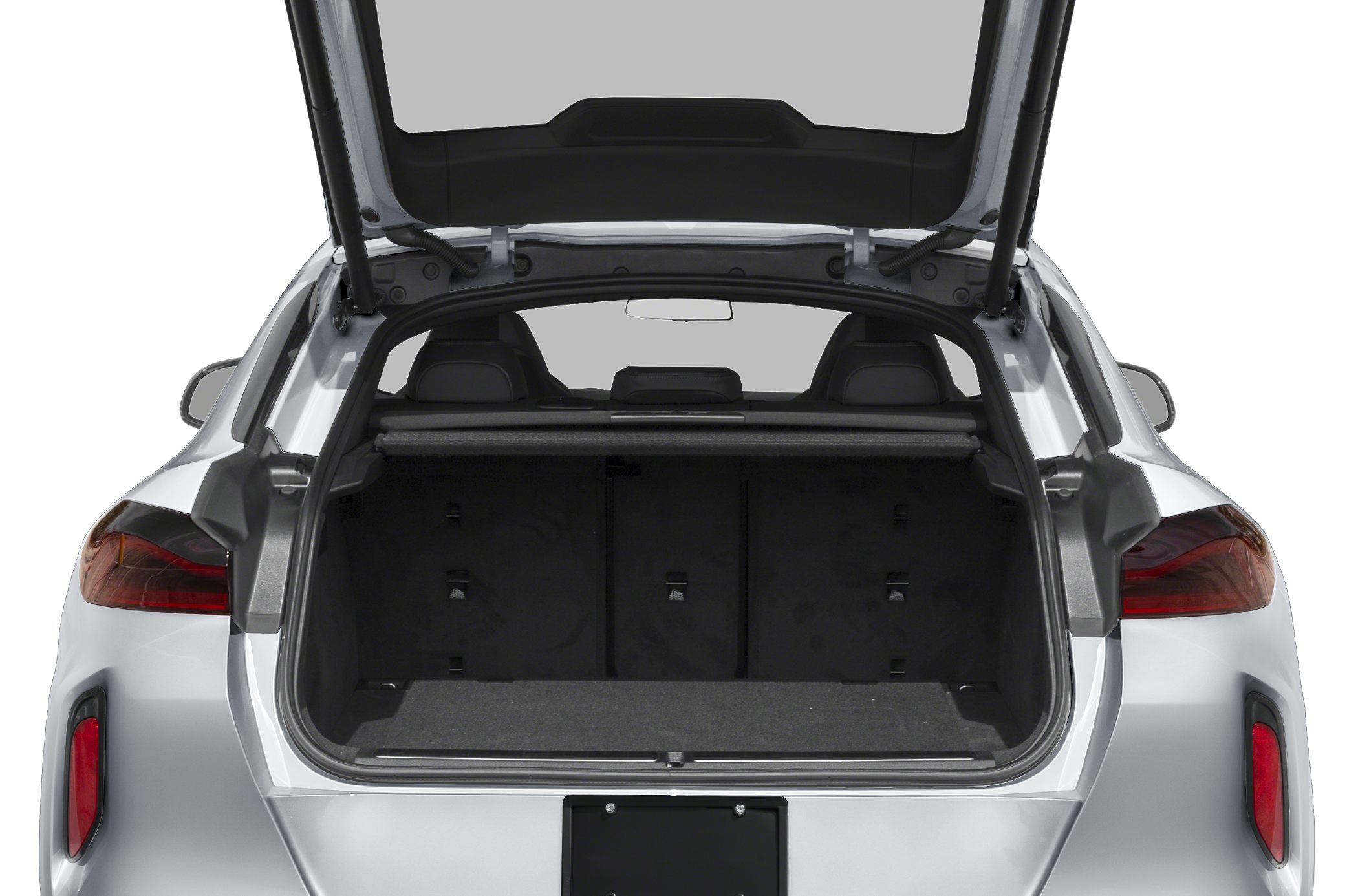 Open rear cargo space with tailgate raised revealing loading area