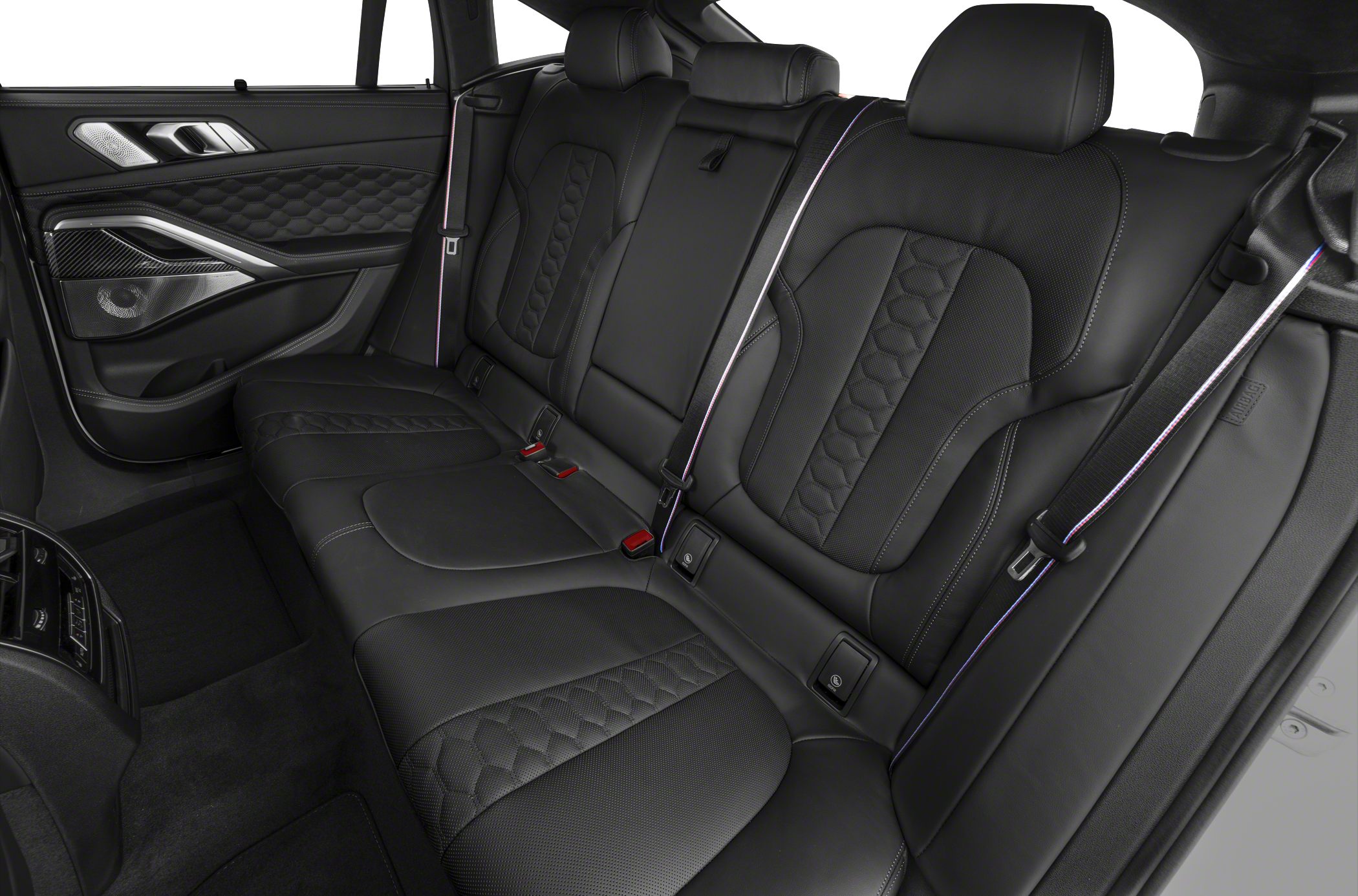 Luxury black leather rear seats with detailed stitching and premium door panel