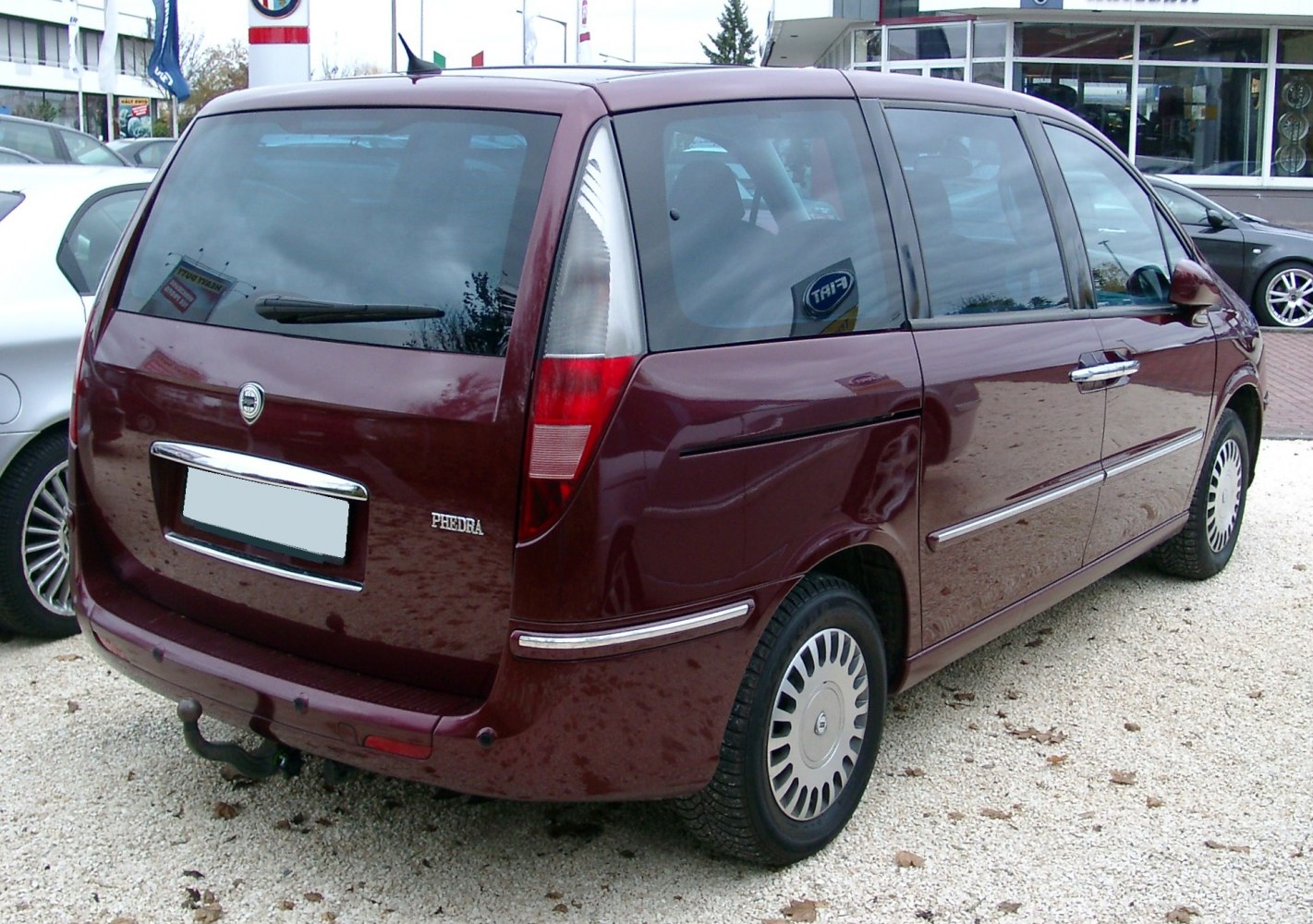 Rear view with vertical taillights and spacious minivan layout