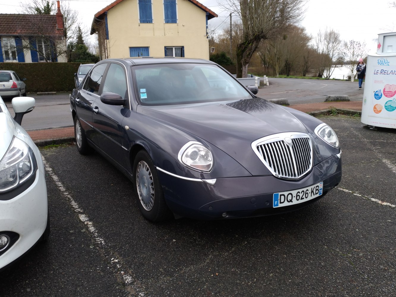 Unique front grille and rounded headlights in a luxury sedan