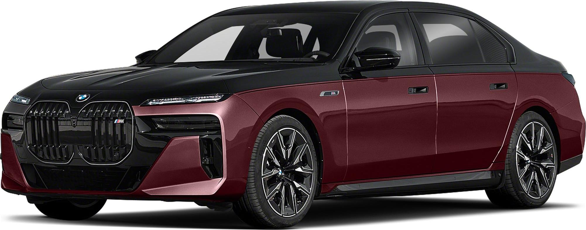 Bold front grille and stylish alloy wheels on a two-tone luxury sedan