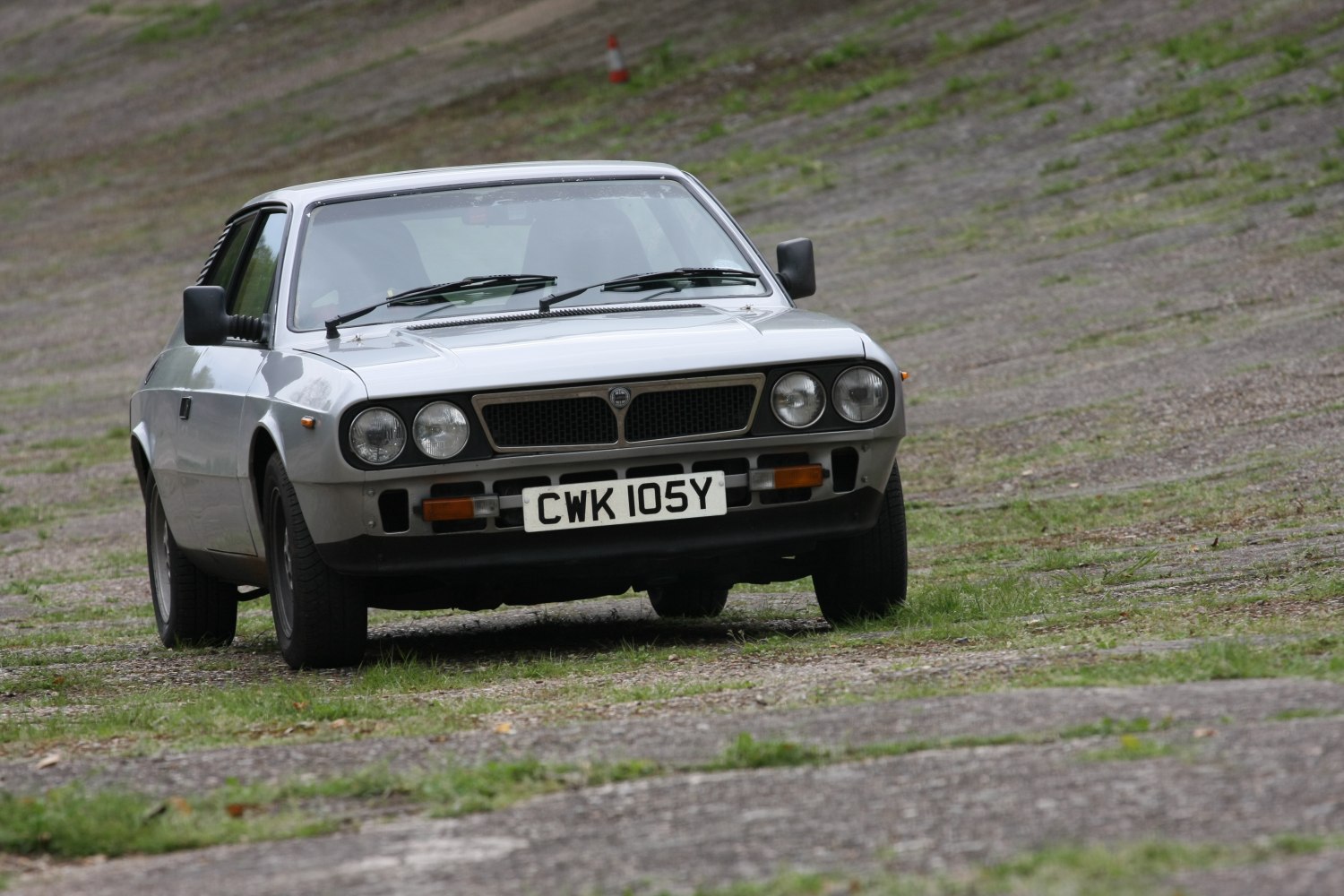 Classic front view with quad round headlights and distinctive grille