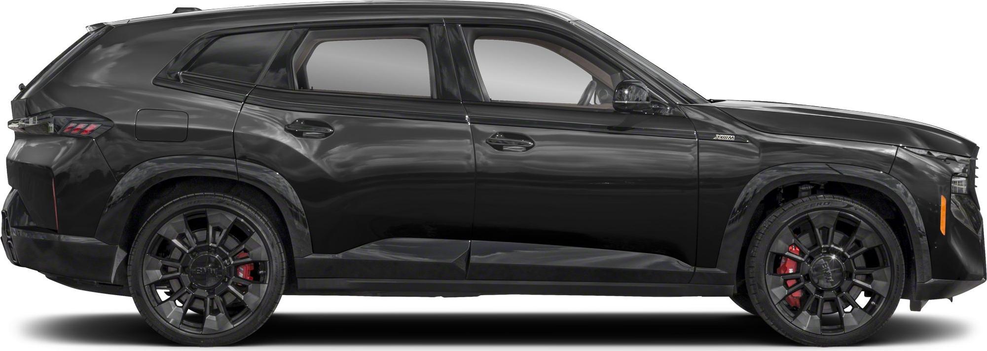 Side profile of a black SUV with large black wheels and sharp body lines
