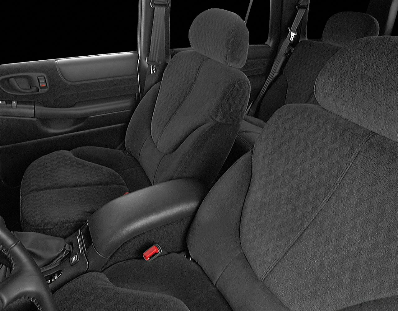 Padded front seats with headrests and textured door panel