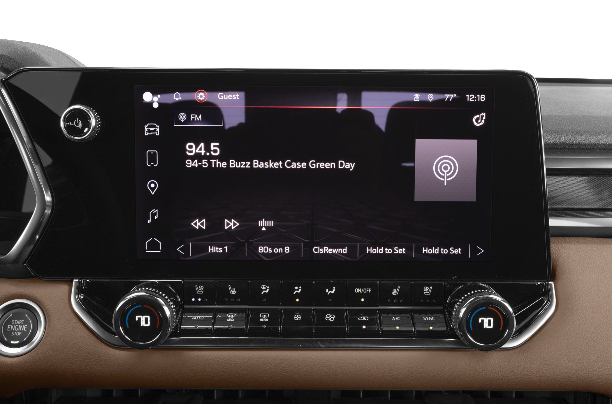 Large digital infotainment screen showing FM radio and climate controls