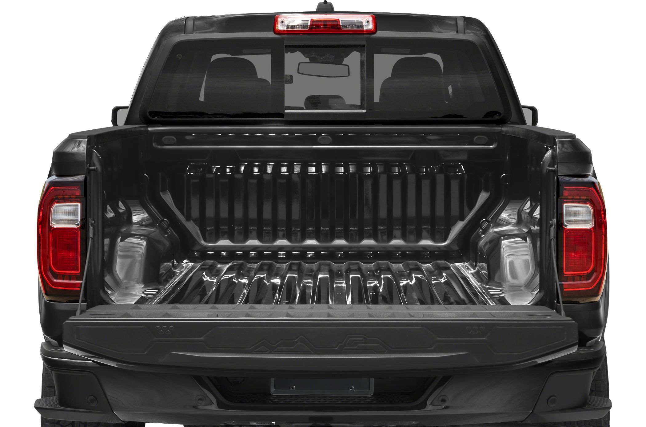 Open tailgate with visible truck bed and rear cab window