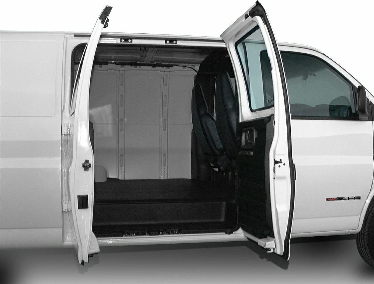 Open side doors revealing spacious cargo area inside van
