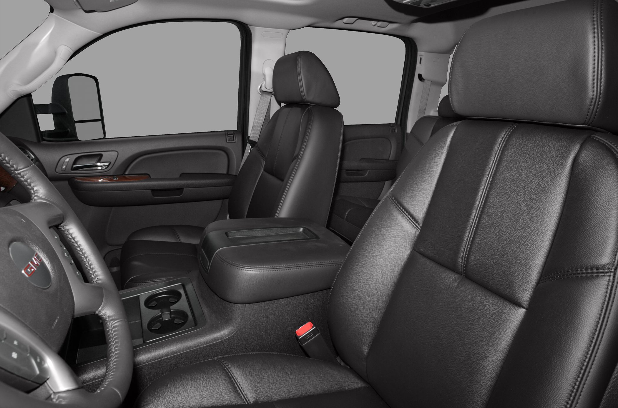 Black leather front seats with armrest and cup holders