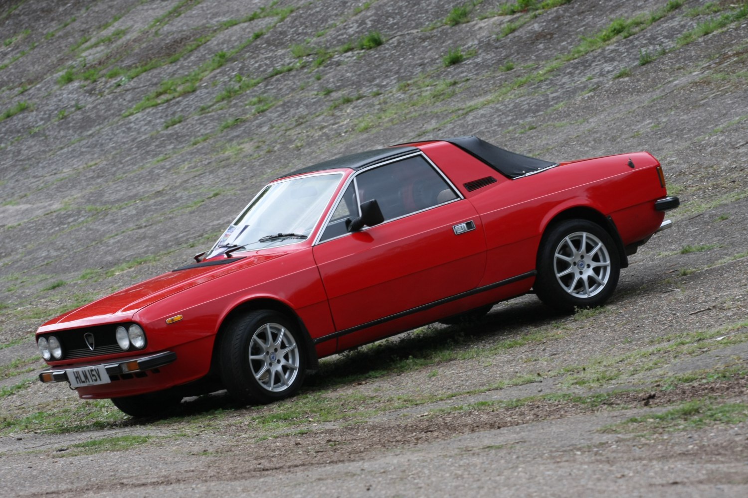 Classic coupe with targa roof and dual round headlights