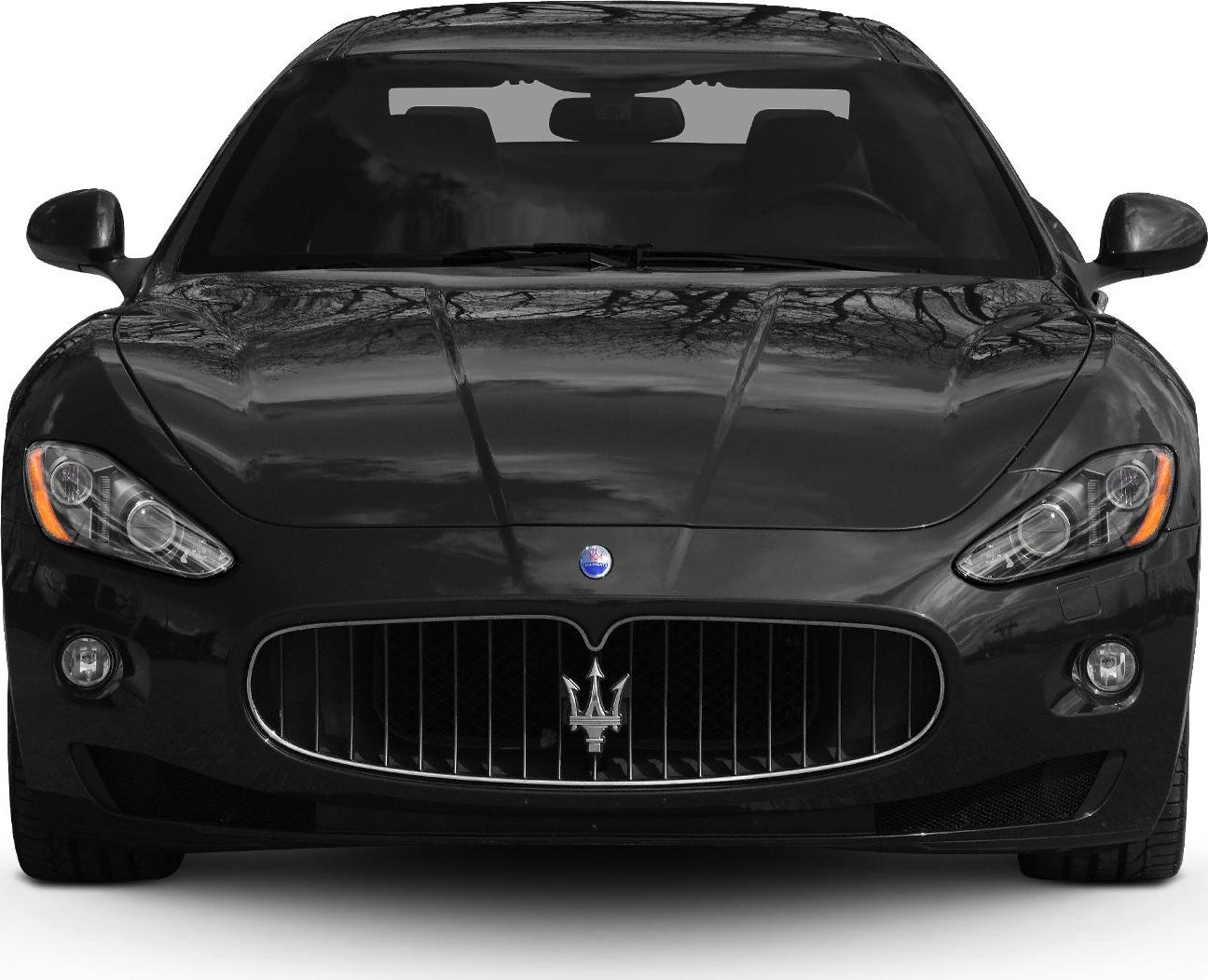 Front view with prominent grille and sleek headlights