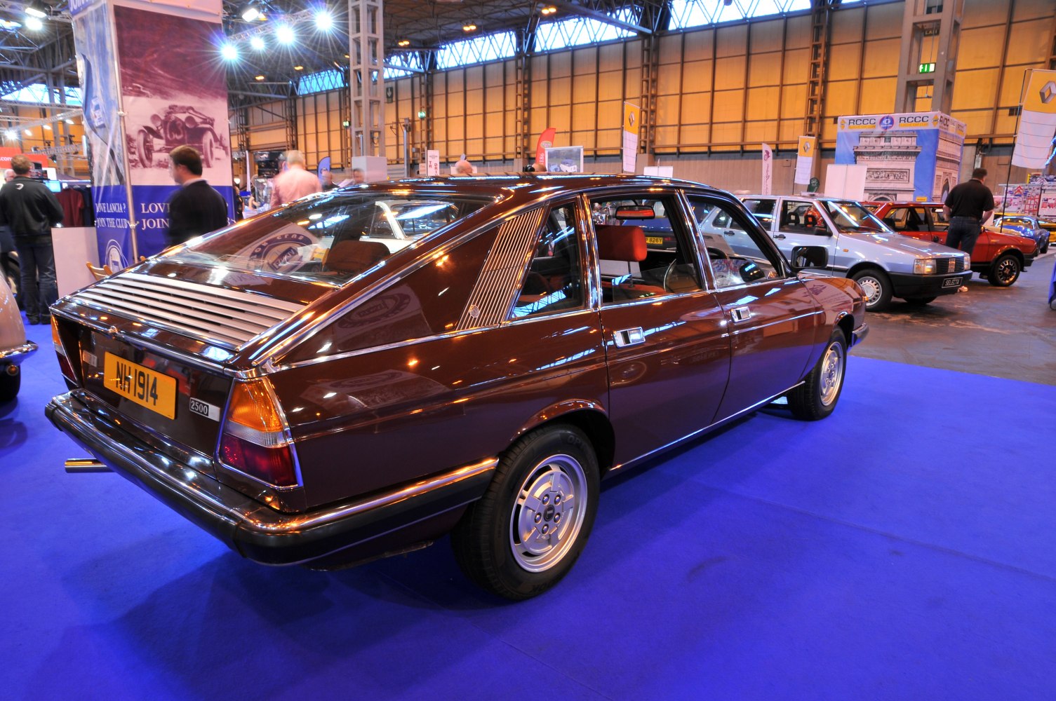 Vintage hatchback rear 3/4 angle with distinctive louvers and pillar detailing