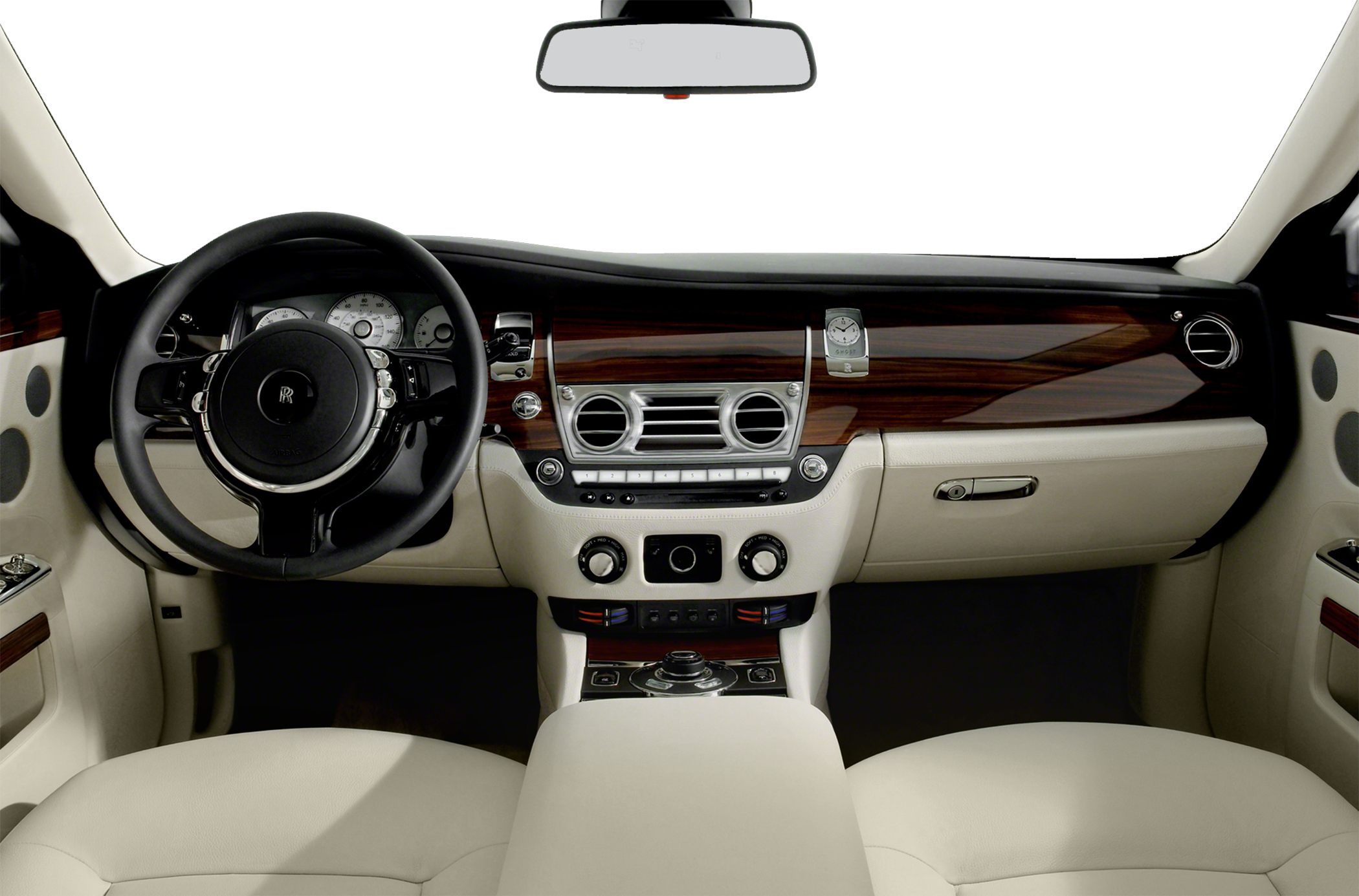 Luxury car interior with wood trim and branded steering wheel