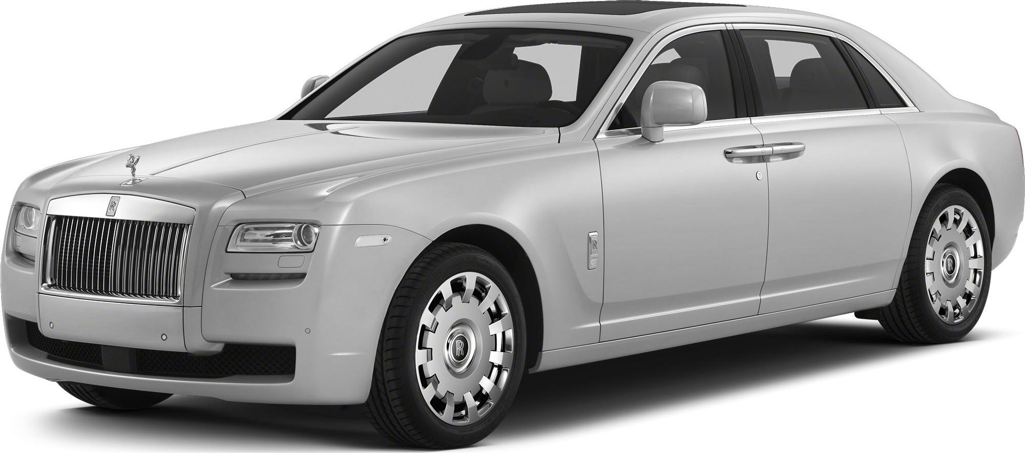 Silver luxury sedan with vertical-slat grille and Spirit of Ecstasy ornament