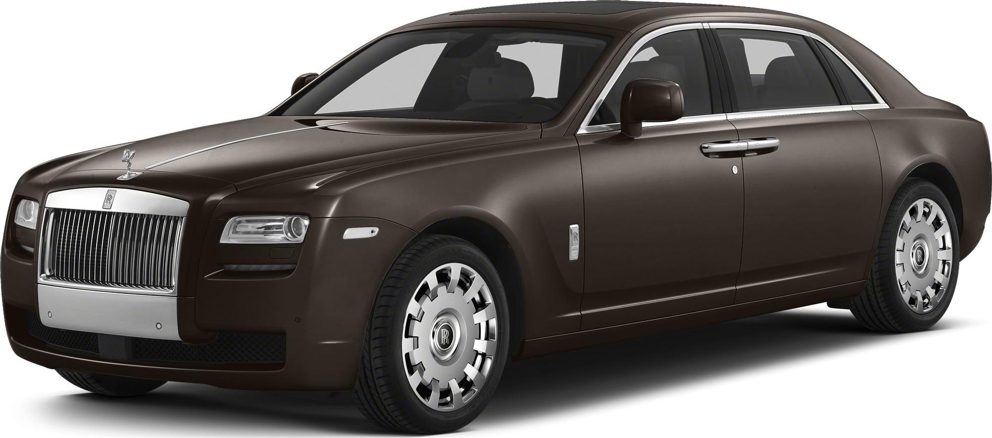 Luxury sedan with vertical slat grille and iconic hood ornament