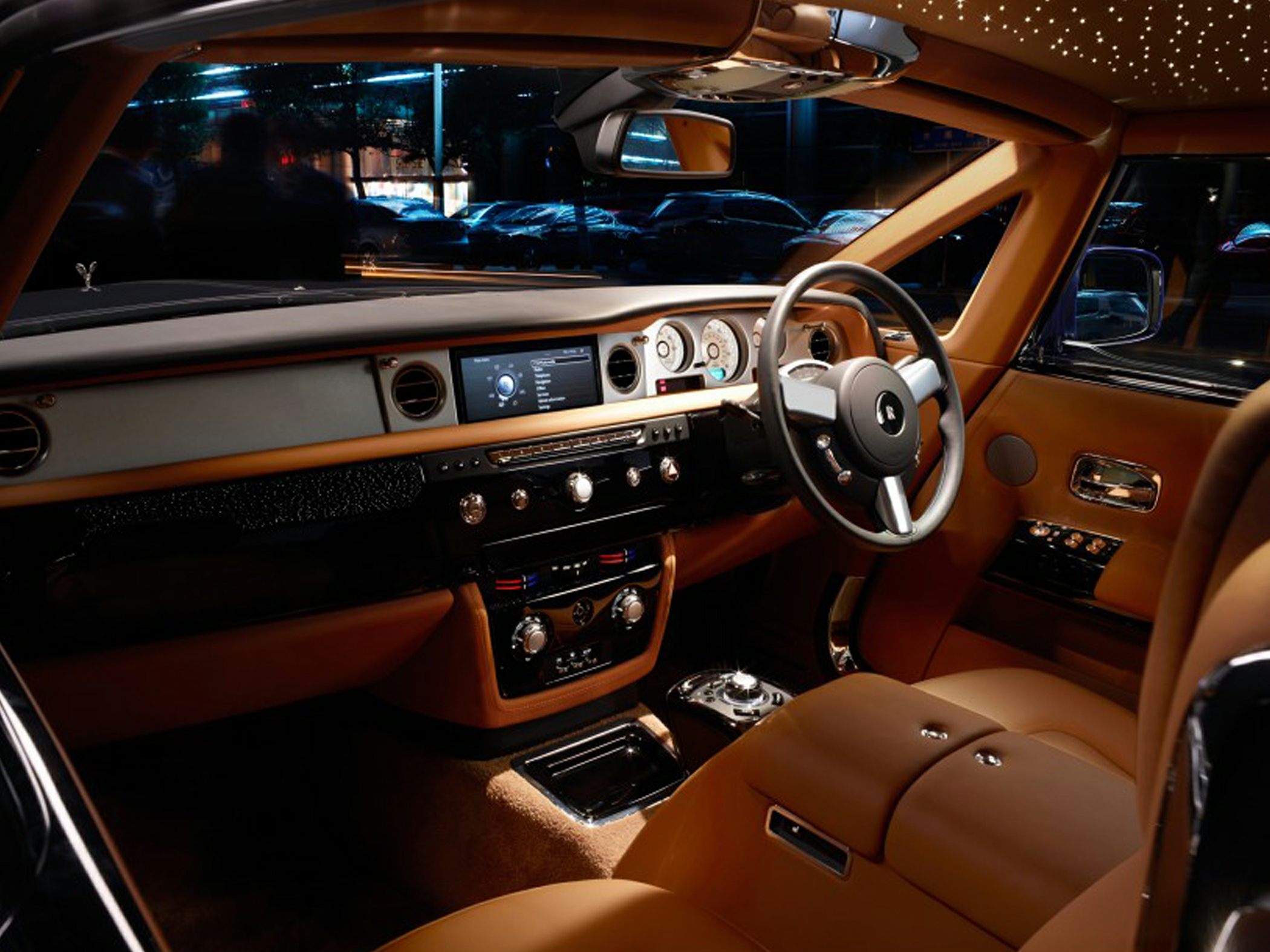 Luxury car interior with starry ceiling and premium leather upholstery