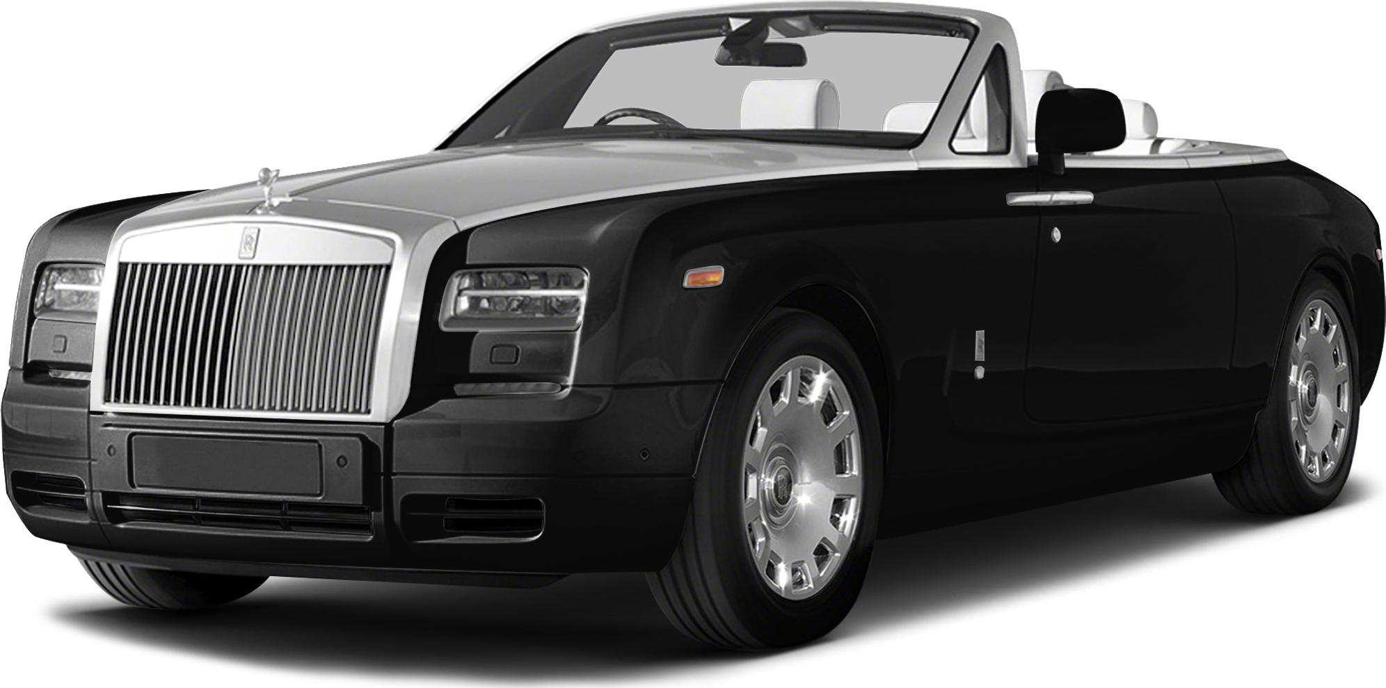 Front view of a black luxury convertible with prominent grille and open roof.