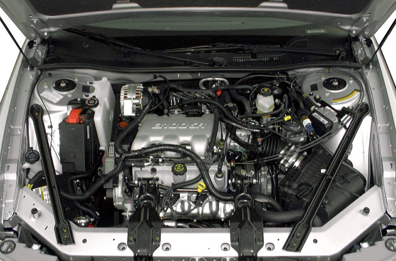 Engine bay with visible mechanical components and wiring
