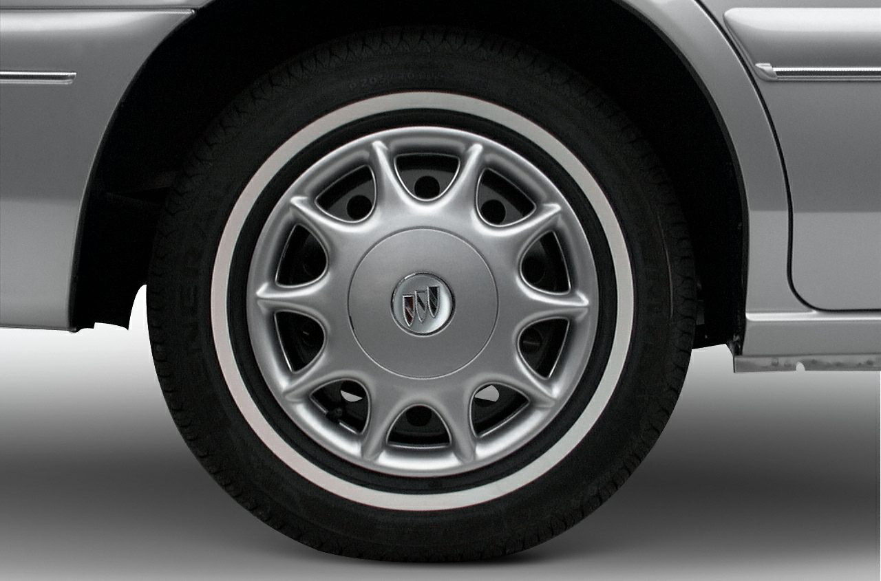 Silver alloy wheel with unique spoke design and Buick emblem center