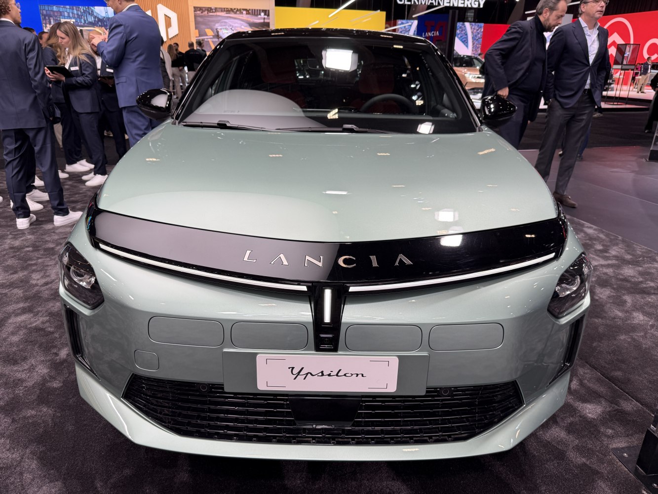 Front view of car with sleek grille and modern headlights