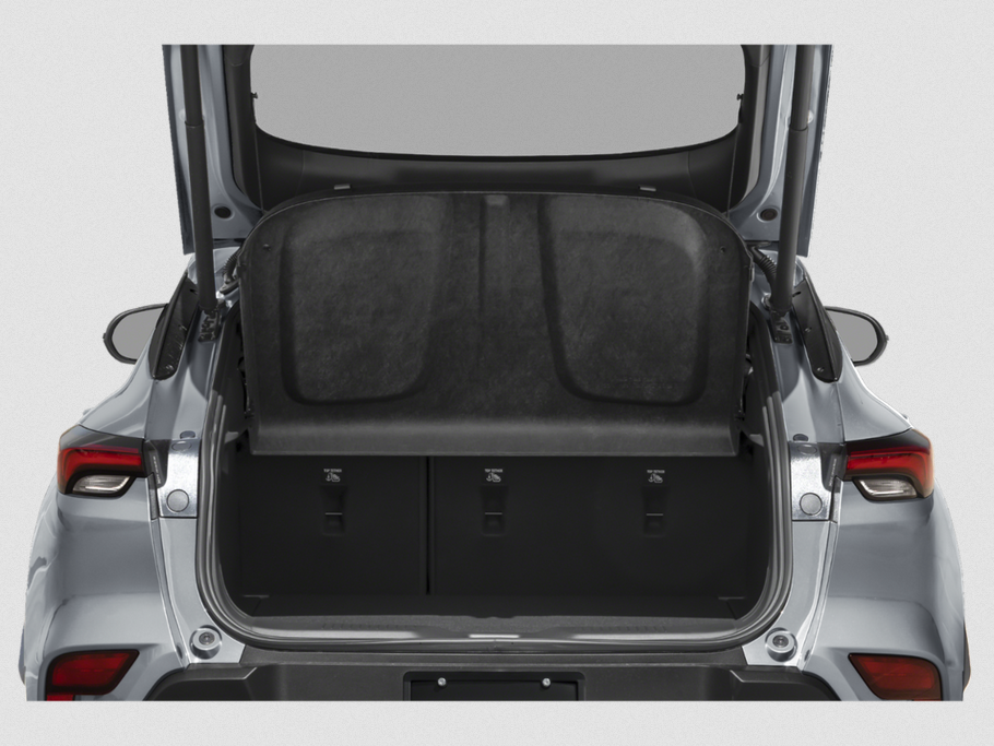 Spacious open trunk with cargo cover and rear tail lights.