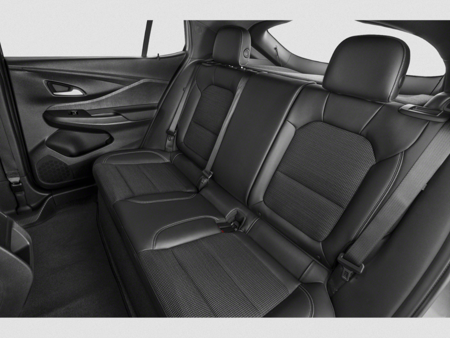 Rear seat interior with premium upholstery and seatbelts