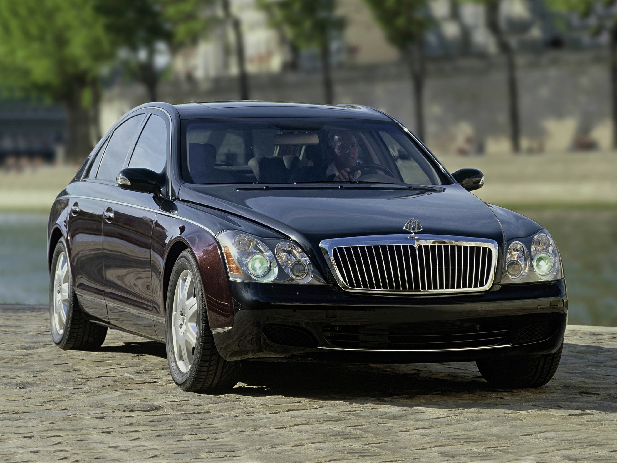 Luxury sedan front with unique grille and dual round headlights