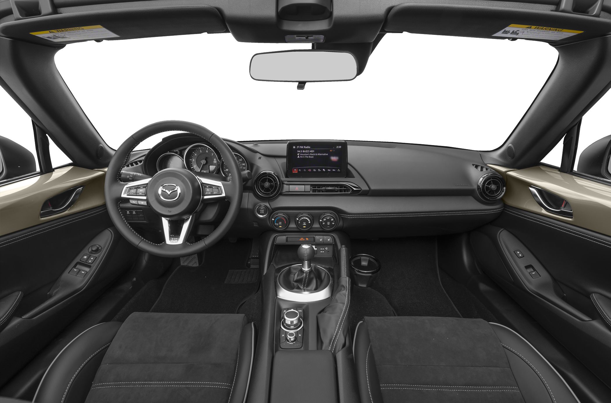 Dashboard, steering wheel, infotainment screen, and manual gearshift interior view