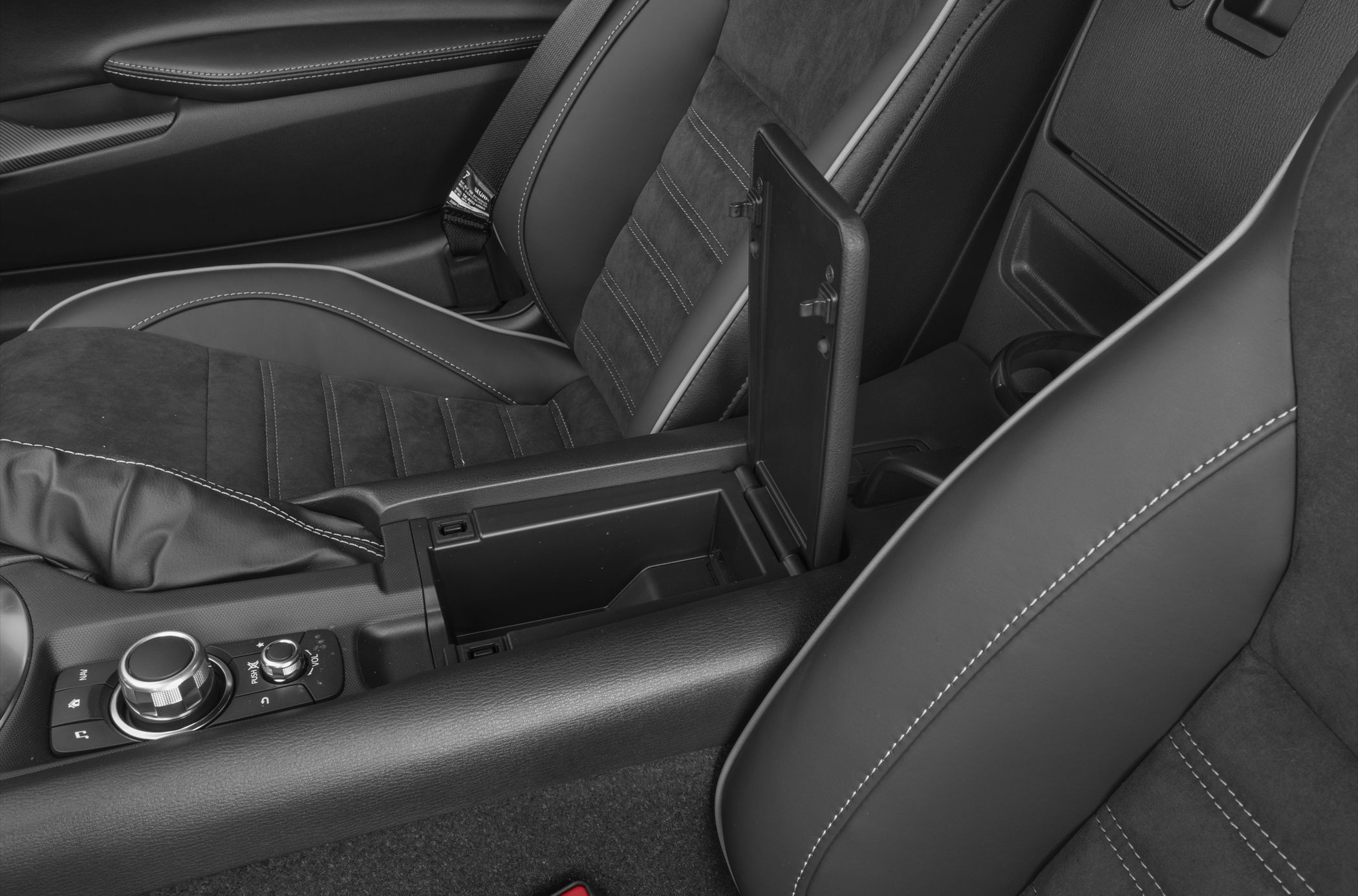 Center console with storage compartment and control dials