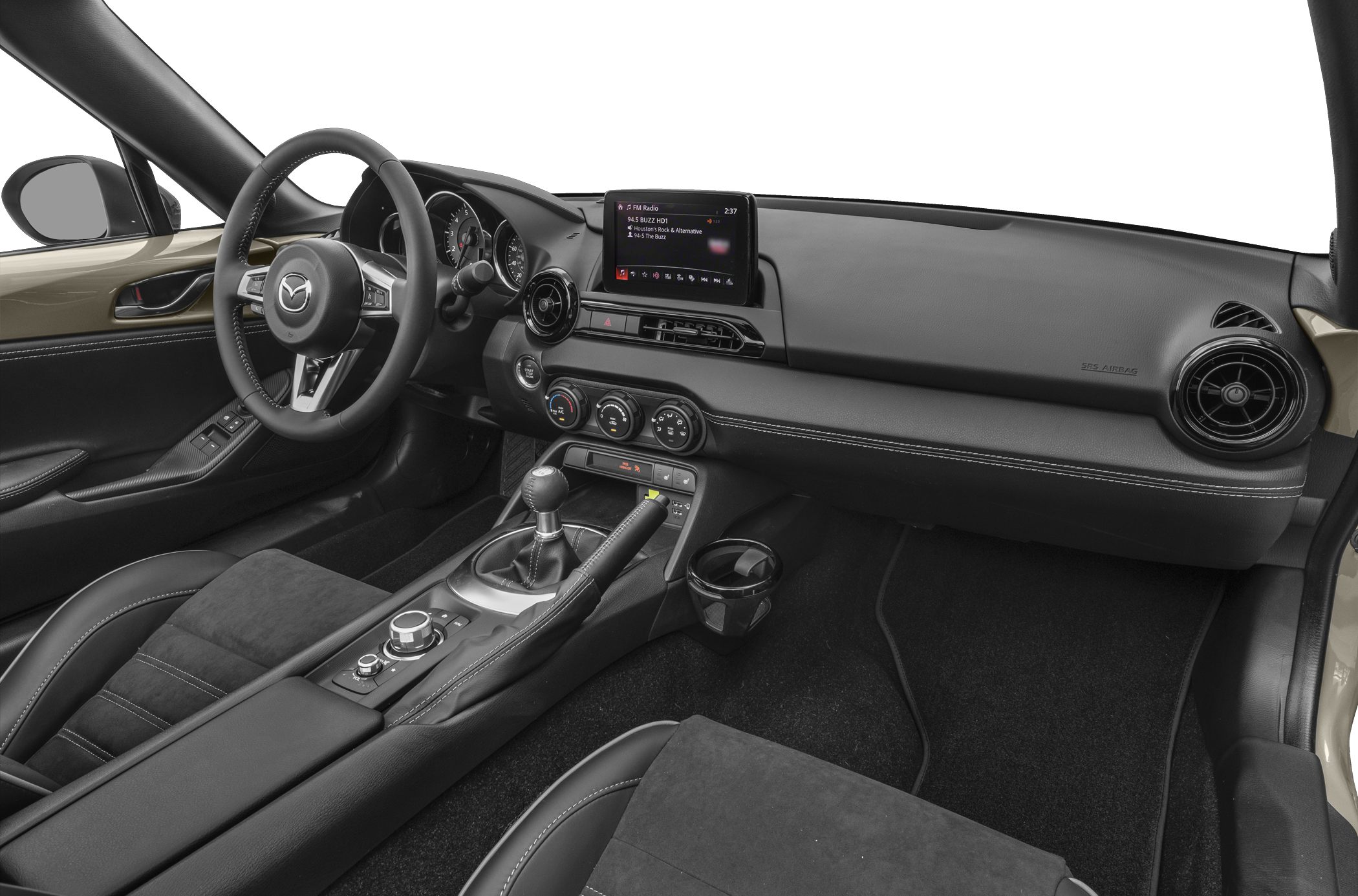 Modern interior with dashboard, infotainment screen and manual transmission