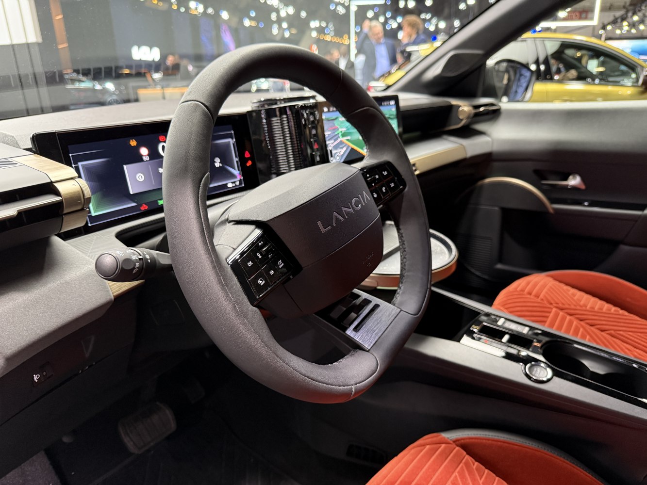 Digital dashboard and multifunction steering wheel with red seats