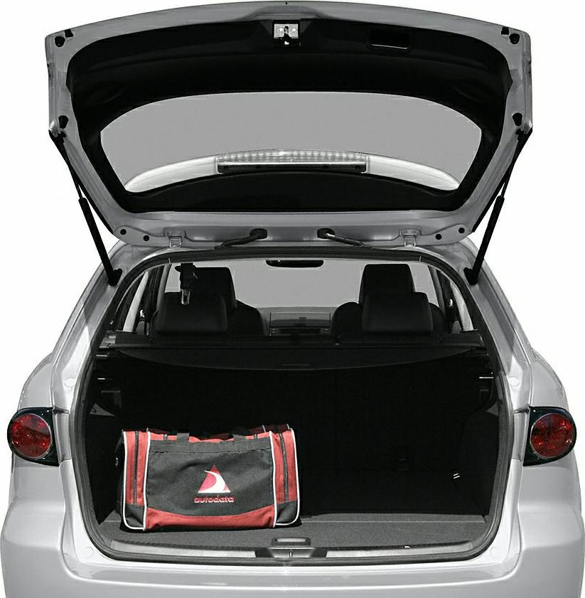 Open hatchback trunk with spacious cargo area and bag inside