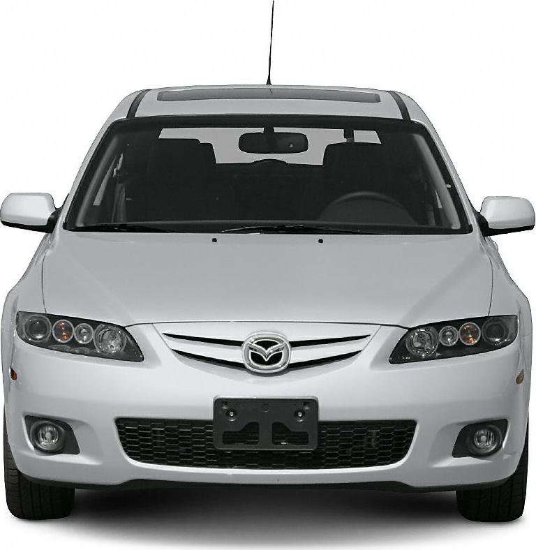 Front view with grille, headlights, fog lights, windshield and mirrors.