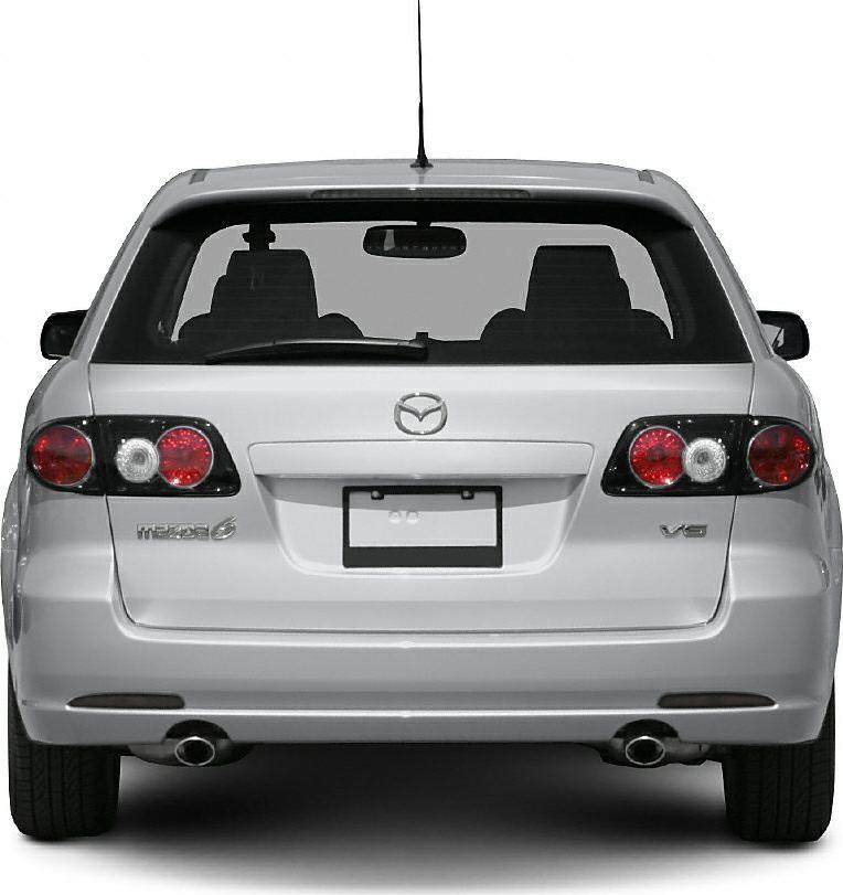 Rear view with dual exhaust and classic tail lights
