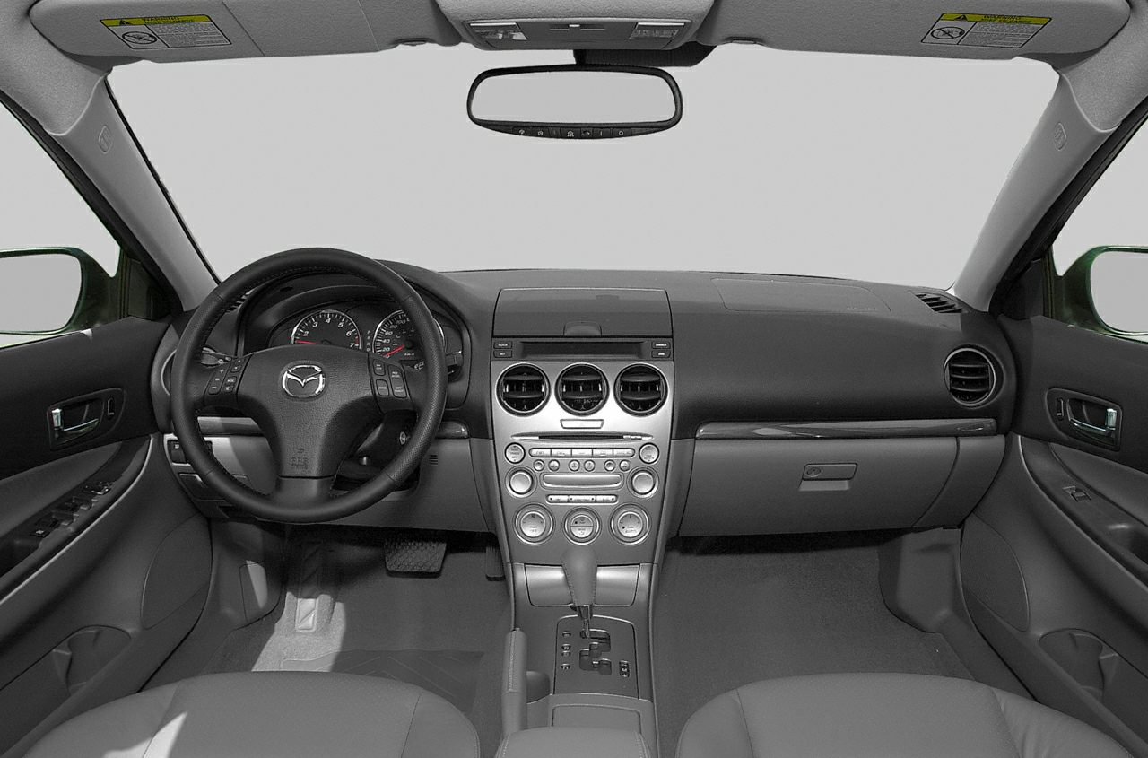 Dashboard layout and steering wheel with control buttons
