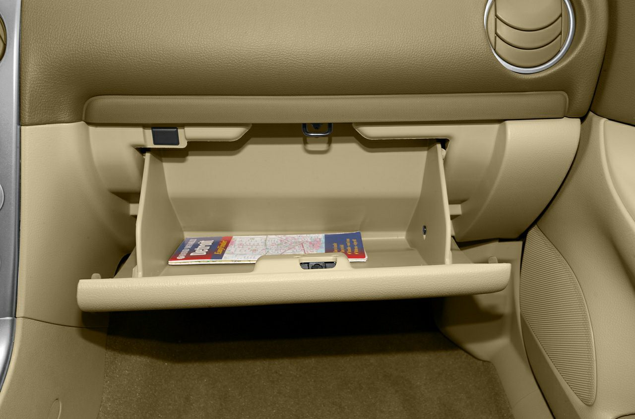 Beige beige open glove compartment with map inside