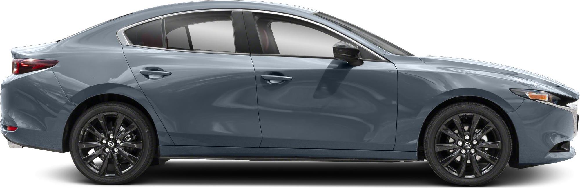 Side profile with black alloy wheels and tinted windows