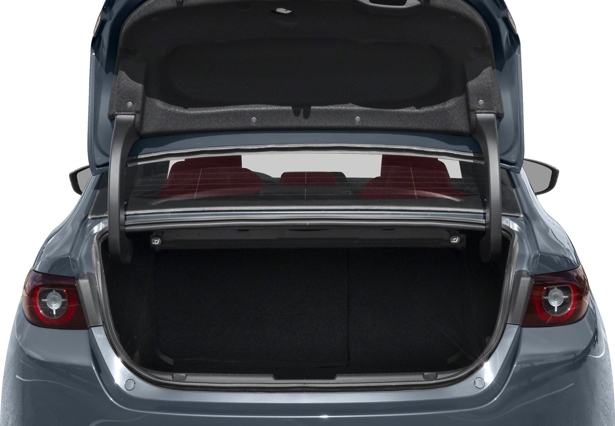 Open trunk with spacious cargo area and rear seatback visible