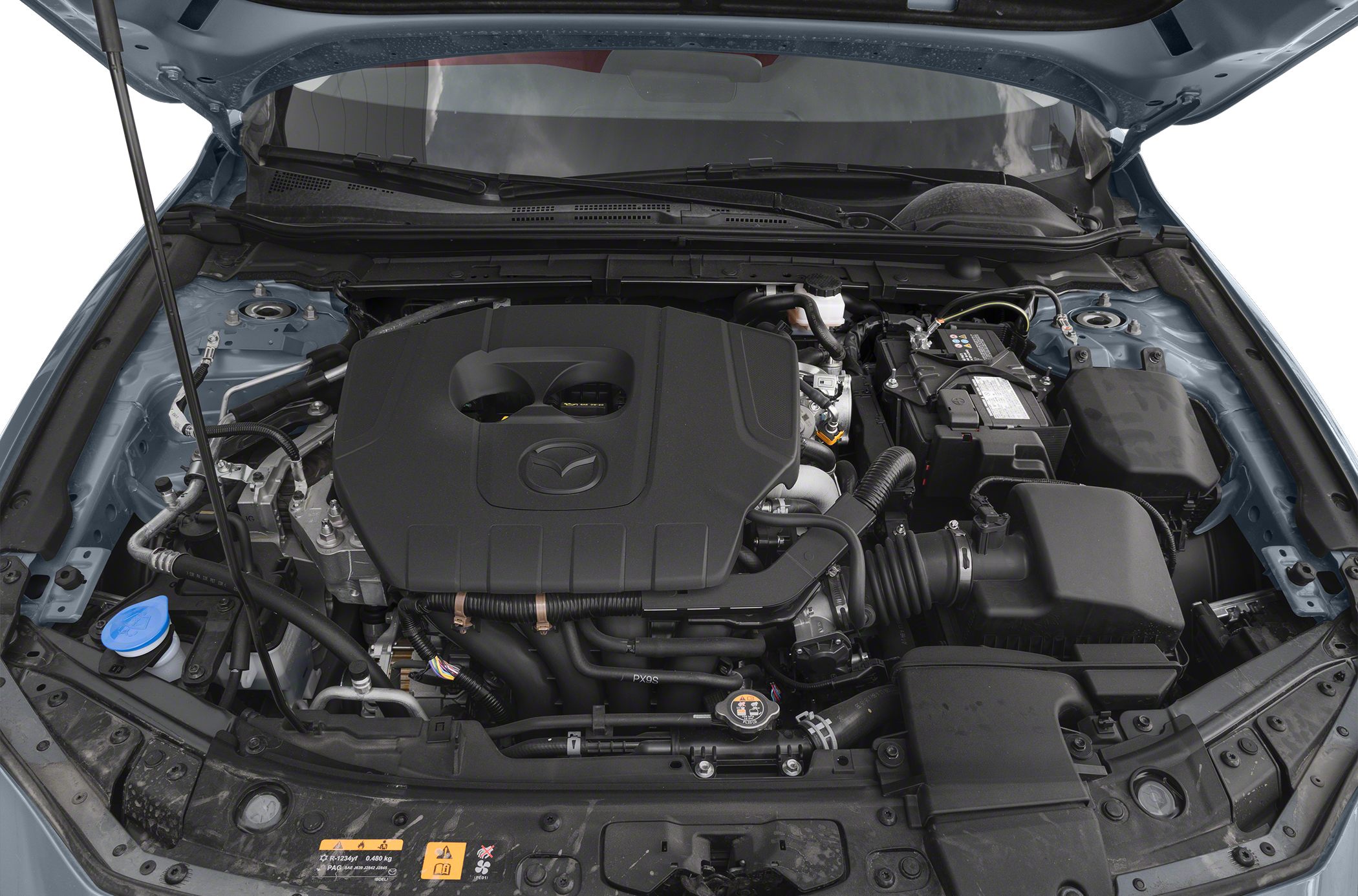 Modern engine compartment with compact layout and visible air intake system